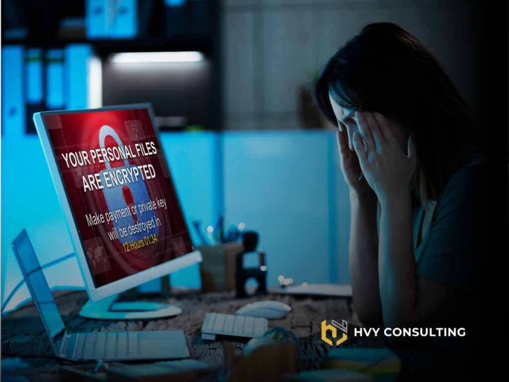 Worried lady facing the computer having her system hacked by a hacker